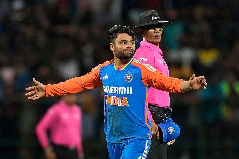 | Photo: AP/Eranga Jayawardena : Rinku Singh celebrates.